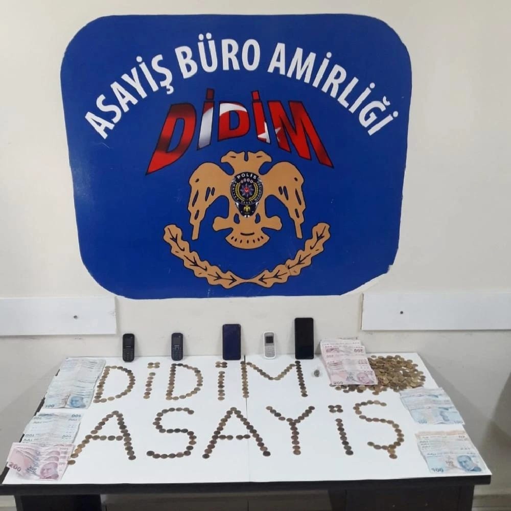 Didim’de sahte altınlı dolandırıcılar polise takıldı