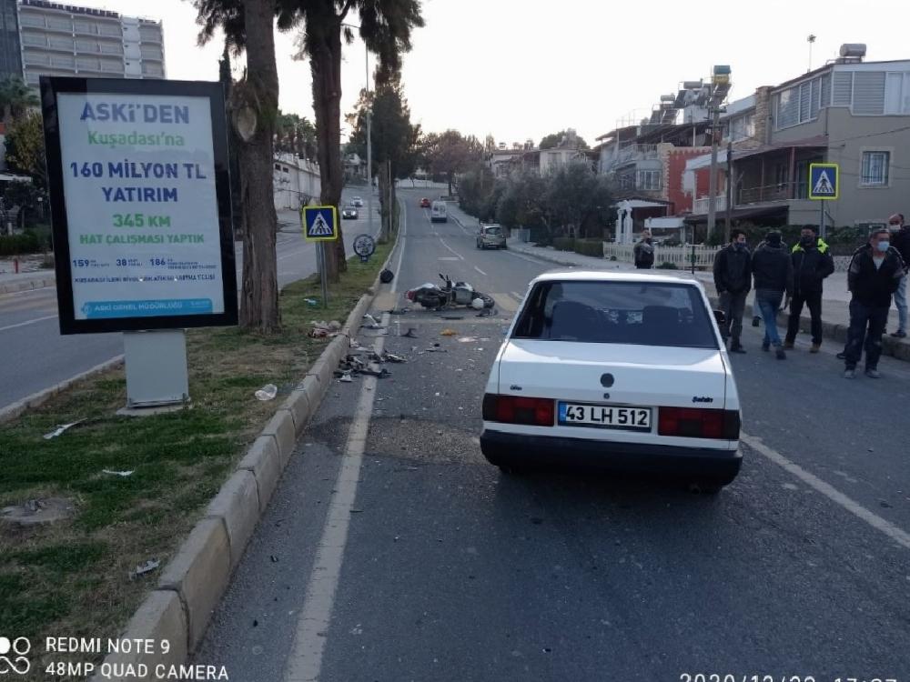 kusadasinda-motosiklet-ile-otomobil-carpisti1-agir-yarali-YOFubf8N.jpg